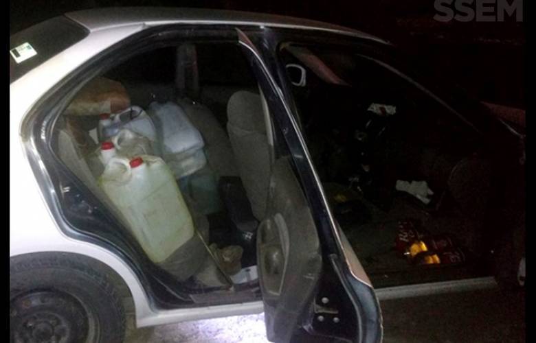 Policía municipal de Temoaya con garrafones, manguera e hidrocarburo es detenido